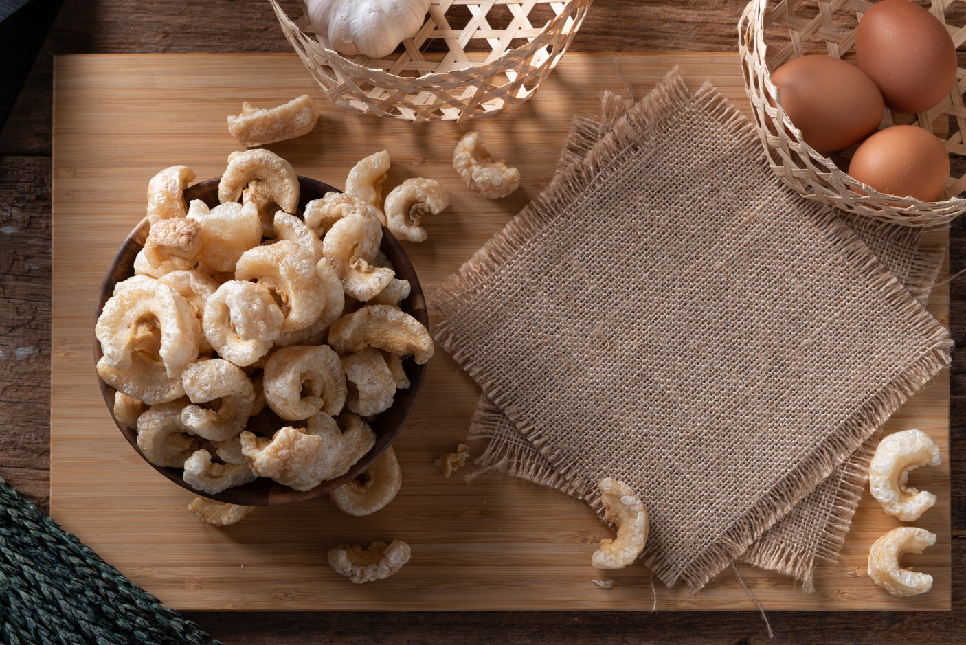 Pork rinds also known as chicharon or chicharrones , kab moo