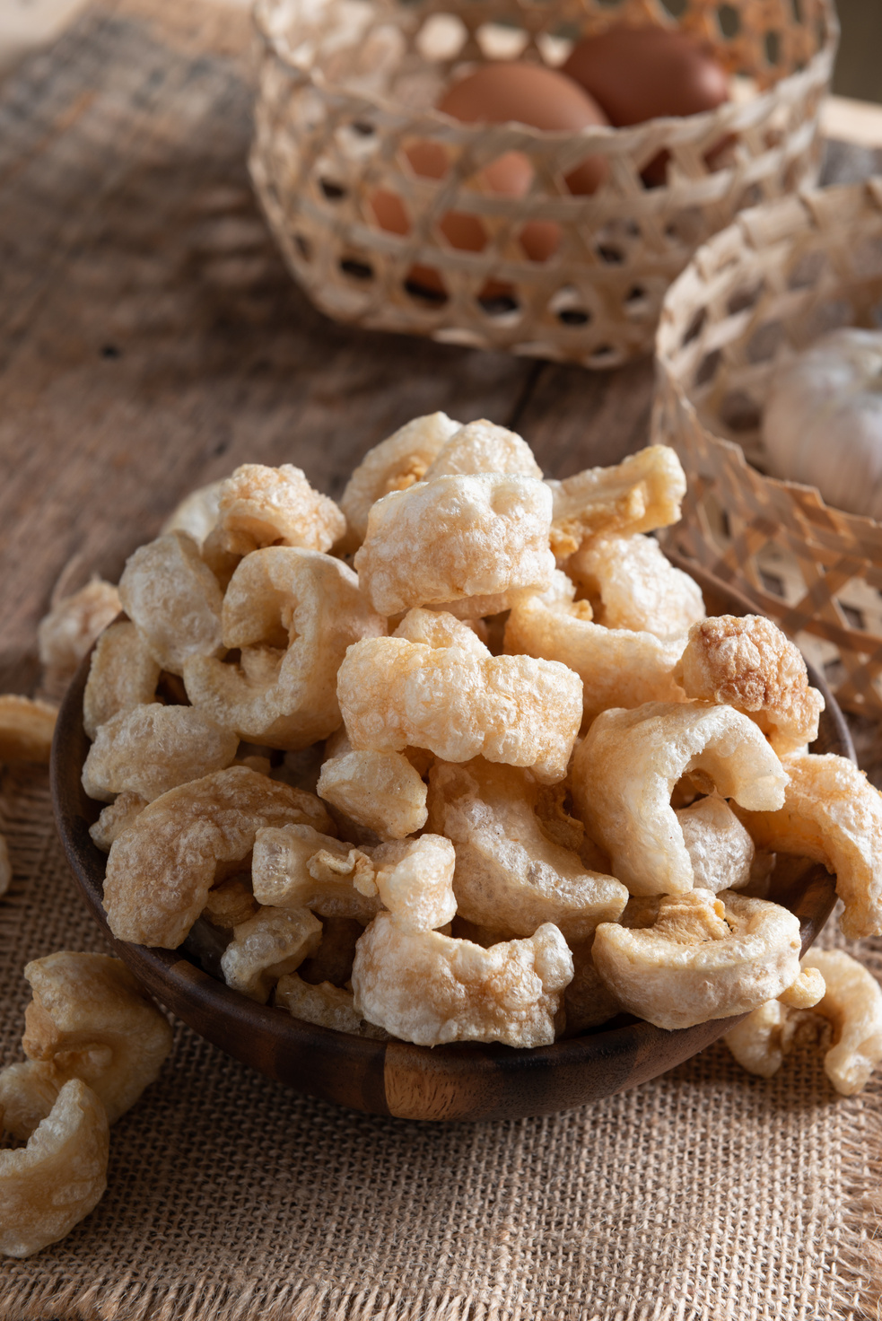 Pork rinds also known as chicharon or chicharrones , kab moo